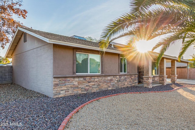 view of property exterior with a patio