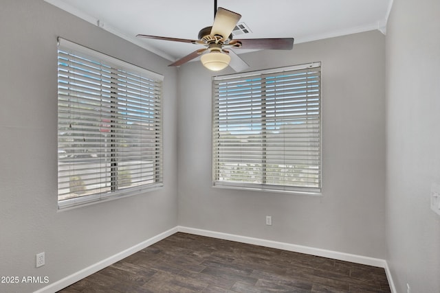 1821 S Navajo Way, Chandler, AZ 85286 - empty room with crown molding, plenty of natural light, ceiling fan, and dark wood finished floors