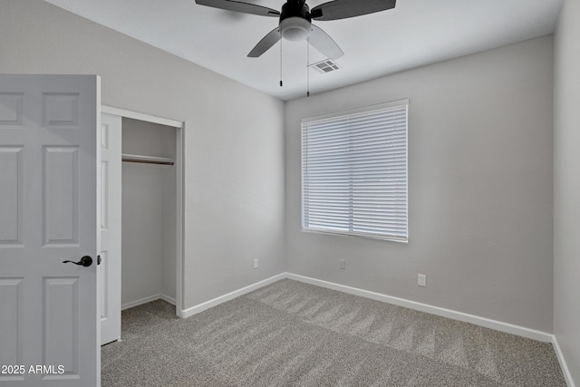 1821 S Navajo Way, Chandler, AZ 85286 - unfurnished bedroom with carpet, a closet, and a ceiling fan