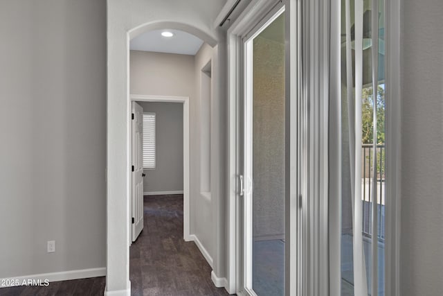 1821 S Navajo Way, Chandler, AZ 85286 - corridor featuring arched walkways and dark wood-style flooring