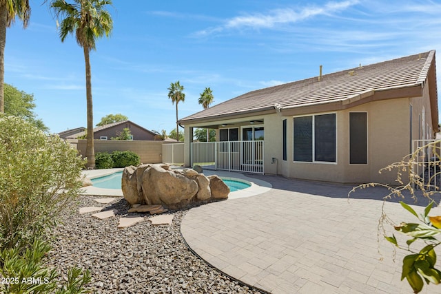 1821 S Navajo Way, Chandler, AZ 85286 - view of pool with a ceiling fan, a fenced backyard, and a patio