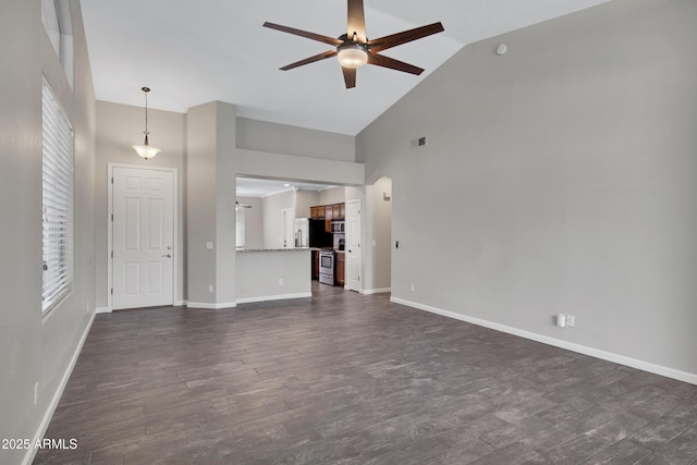 1821 S Navajo Way, Chandler, AZ 85286 - unfurnished living room with a ceiling fan, high vaulted ceiling, and dark wood-style flooring