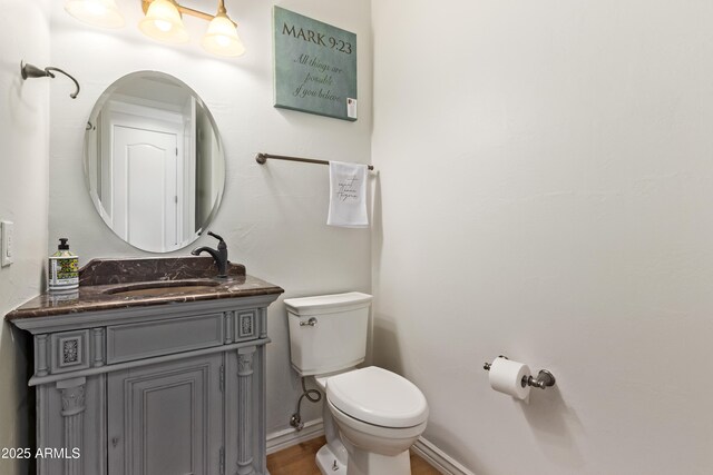 4419 N 24th Way, Phoenix, AZ 85016 - bathroom with toilet, vanity, and baseboards