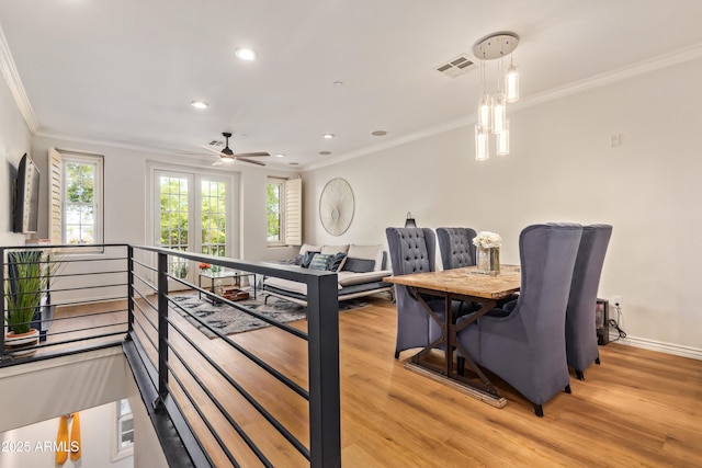 4419 N 24th Way, Phoenix, AZ 85016 - dining area featuring light wood-type flooring, ornamental molding, healthy amount of natural light, recessed lighting, and ceiling fan