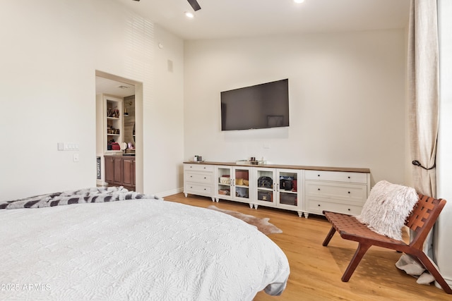 4419 N 24th Way, Phoenix, AZ 85016 - bedroom with light wood finished floors, recessed lighting, ceiling fan, baseboards, and lofted ceiling