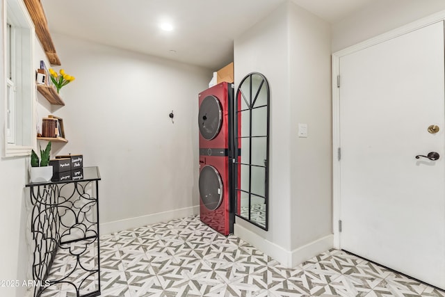 4419 N 24th Way, Phoenix, AZ 85016 - foyer entrance with stacked washer / dryer, light floors, and baseboards