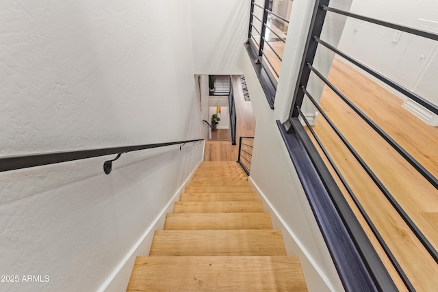 4419 N 24th Way, Phoenix, AZ 85016 - stairway featuring a textured wall and baseboards