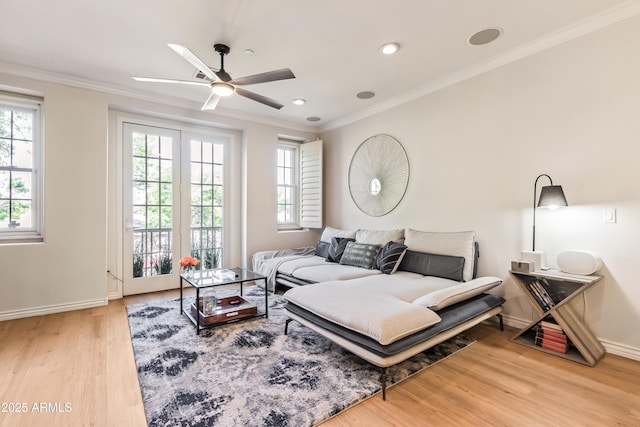 4419 N 24th Way, Phoenix, AZ 85016 - bedroom featuring access to exterior, ornamental molding, wood finished floors, baseboards, and recessed lighting