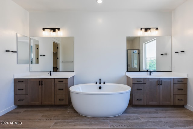 bathroom featuring large vanity and double sink