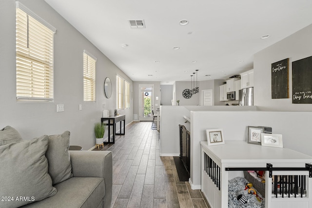 living room with hardwood / wood-style floors