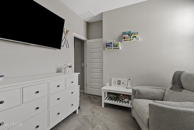 sitting room with light colored carpet