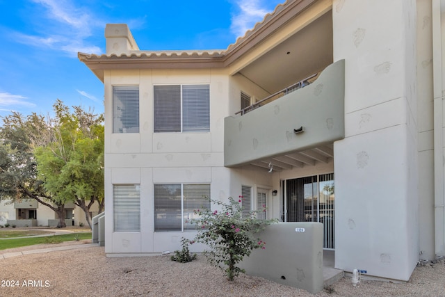 exterior space with a balcony