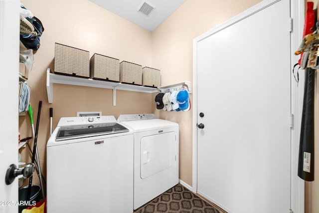 laundry area featuring independent washer and dryer