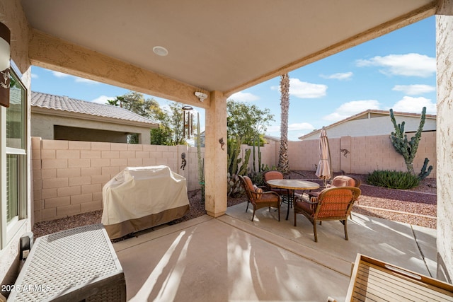 view of patio / terrace featuring a grill