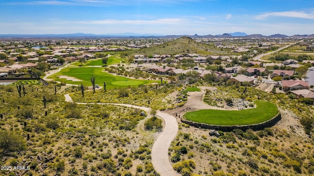 birds eye view of property featuring a mountain view