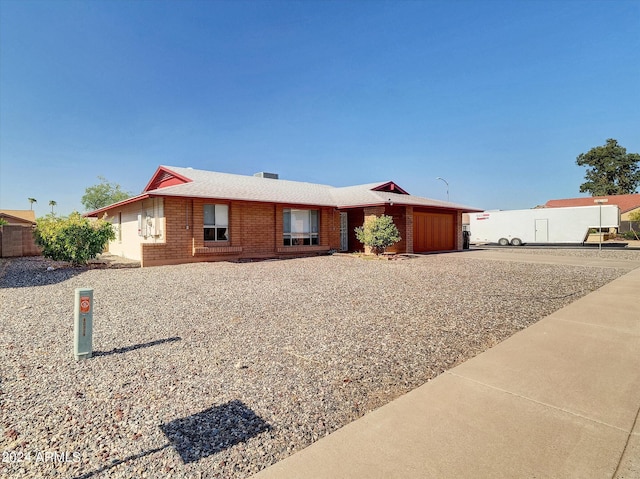 ranch-style home with a garage