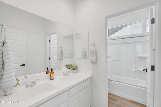 3592 W Cobalt Ct, San Tan Valley, AZ 85144 - full bathroom featuring double vanity, bath / shower combo with glass door, and wood finished floors