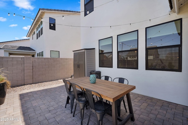 3592 W Cobalt Ct, San Tan Valley, AZ 85144 - view of patio with fence and outdoor dining space