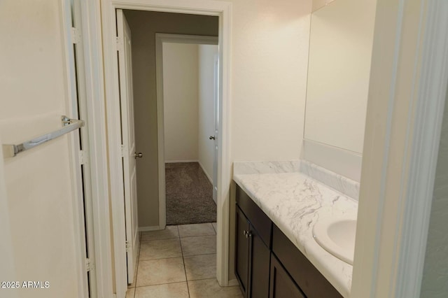 bathroom with vanity and tile patterned flooring
