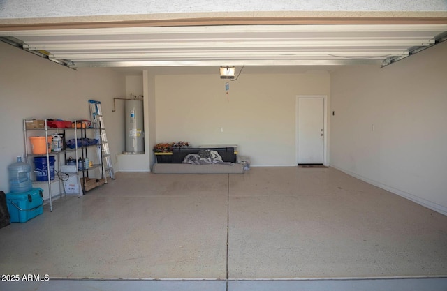 garage with a garage door opener and electric water heater