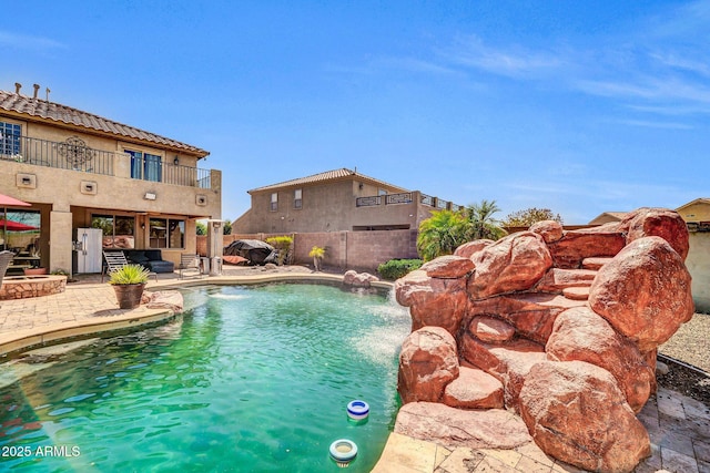 11965 W Monte Vista Rd, Avondale, AZ 85392 - view of swimming pool with a fenced backyard and a patio
