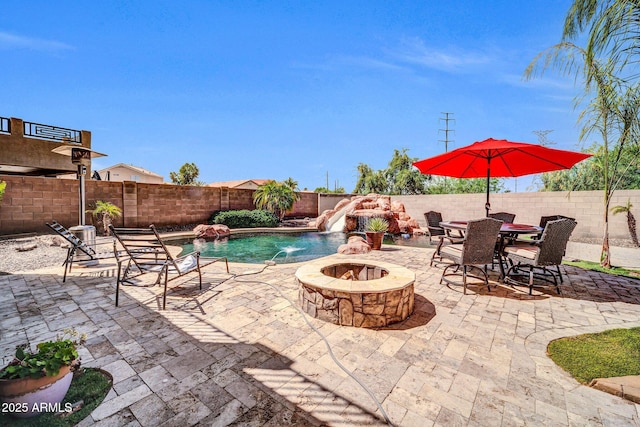 11965 W Monte Vista Rd, Avondale, AZ 85392 - fenced backyard featuring an outdoor fire pit and a patio