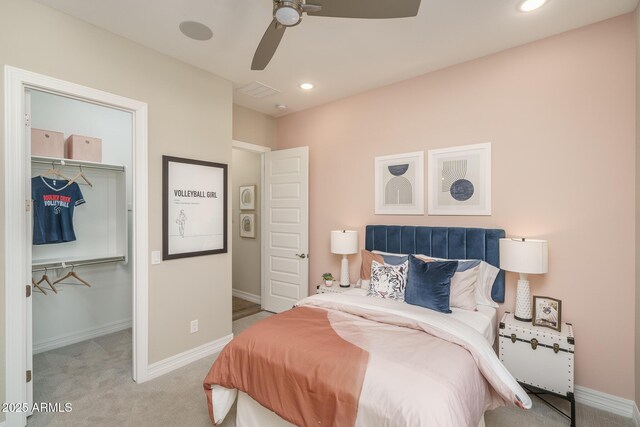 43712 N Acadia Way, New River, AZ 85087 - bedroom with a walk in closet, carpet floors, a closet, baseboards, and recessed lighting