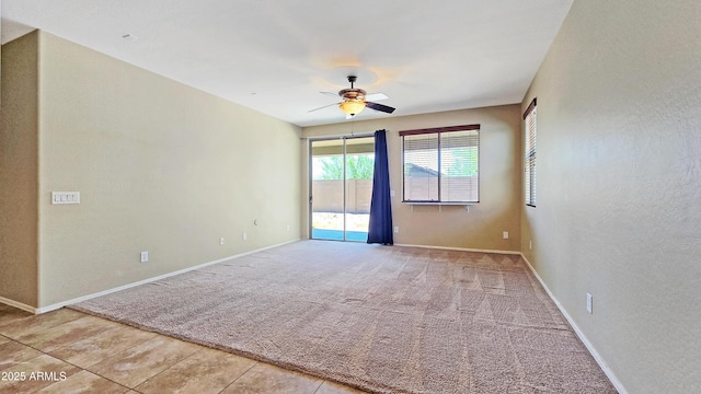 23853 W Hammond Ln, Buckeye, AZ 85326 - carpeted empty room featuring a ceiling fan and baseboards