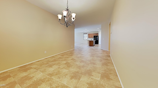 23853 W Hammond Ln, Buckeye, AZ 85326 - unfurnished dining area featuring a chandelier and recessed lighting