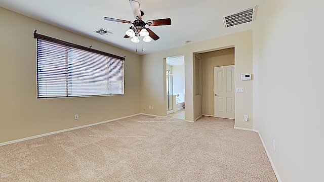 23853 W Hammond Ln, Buckeye, AZ 85326 - spare room featuring a ceiling fan and light carpet