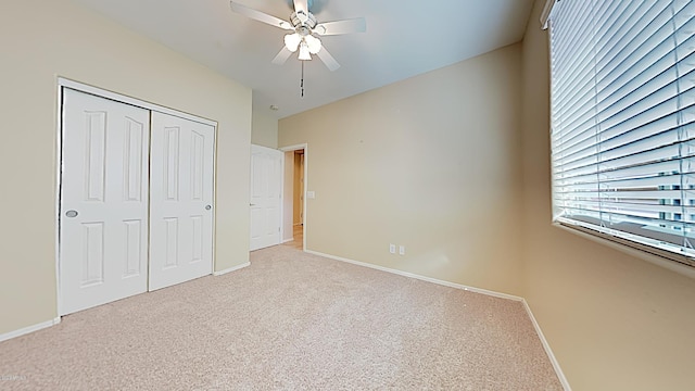 23853 W Hammond Ln, Buckeye, AZ 85326 - unfurnished bedroom featuring carpet flooring, a closet, and a ceiling fan