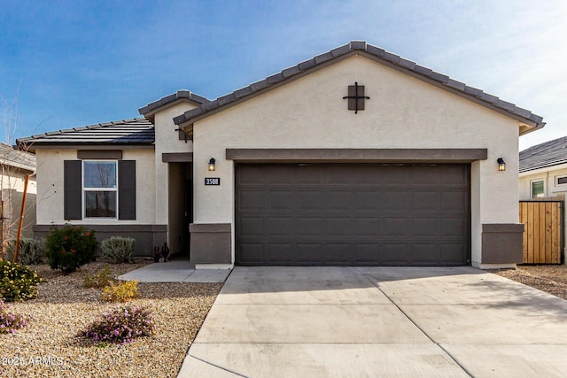 view of front of property with a garage