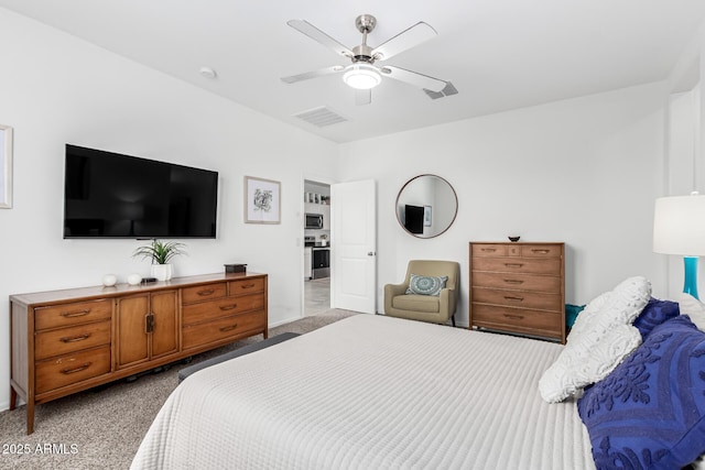 carpeted bedroom featuring ceiling fan