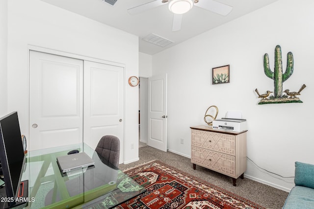 office featuring ceiling fan and carpet