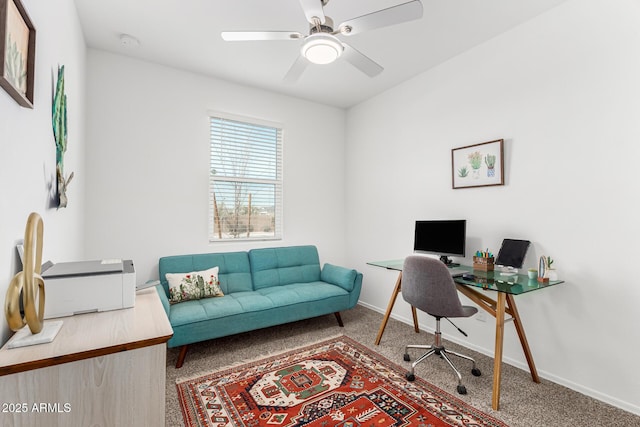 home office featuring carpet flooring and ceiling fan