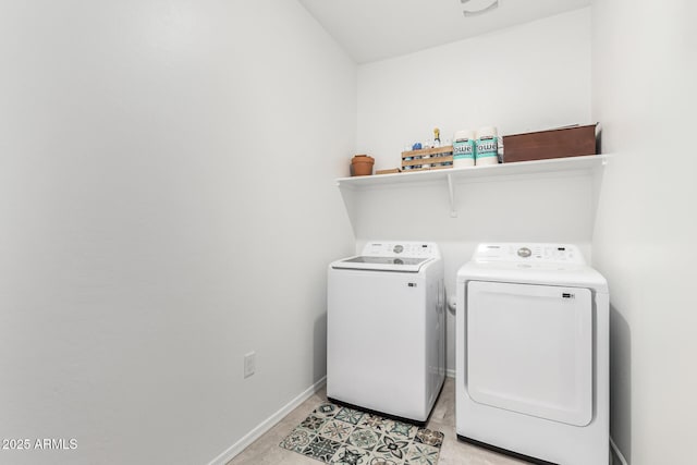 washroom with separate washer and dryer