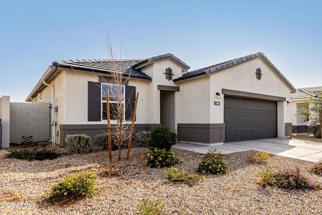 single story home featuring a garage