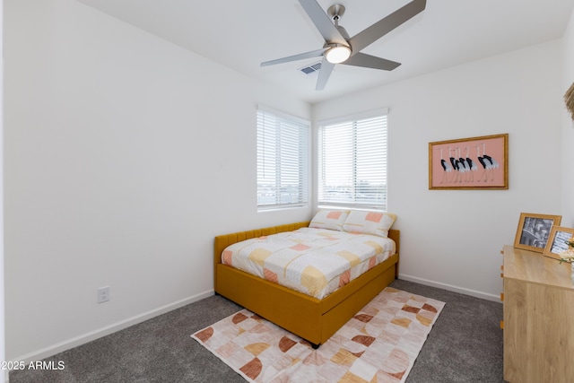 bedroom with ceiling fan and carpet flooring