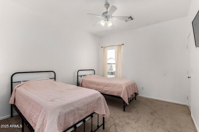 bedroom with a ceiling fan, carpet floors, baseboards, and visible vents