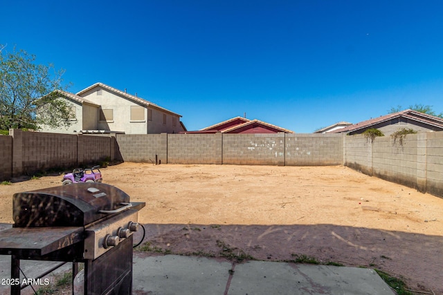 view of yard featuring a fenced backyard