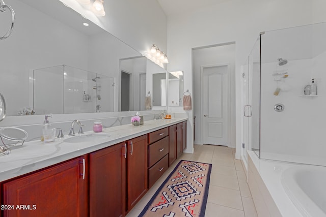 bathroom featuring tile patterned flooring, vanity, and independent shower and bath