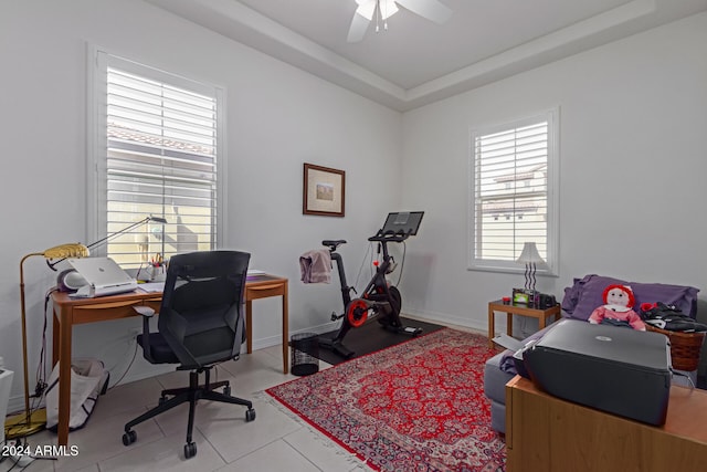 tiled home office with ceiling fan