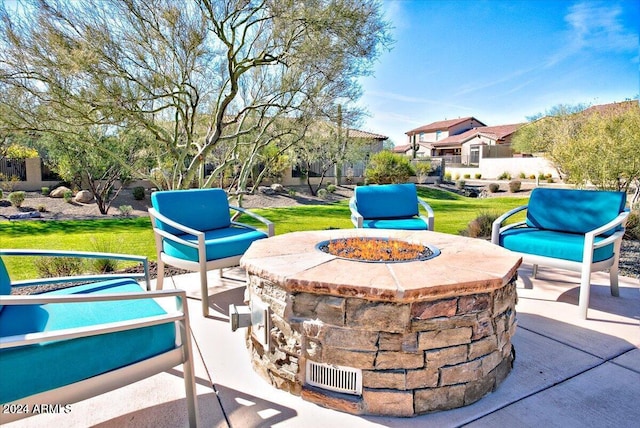 view of patio / terrace with an outdoor fire pit