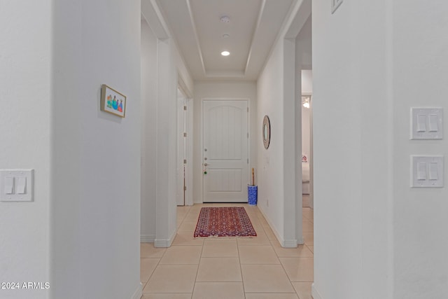 corridor featuring light tile patterned flooring