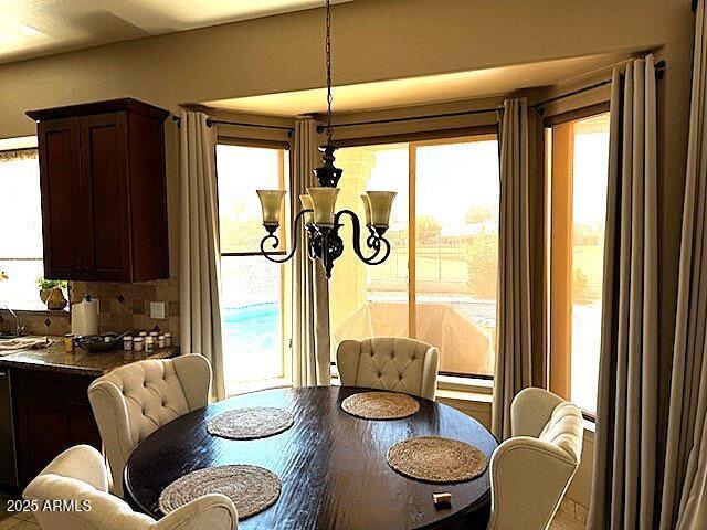 dining room with an inviting chandelier