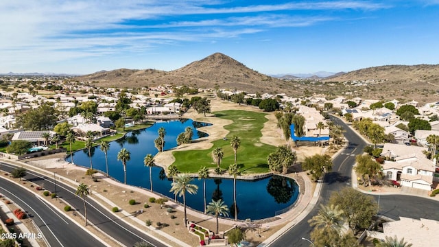 bird's eye view featuring a residential view and a water and mountain view