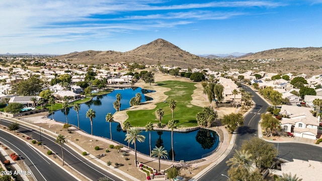 aerial view with a residential view and a water and mountain view