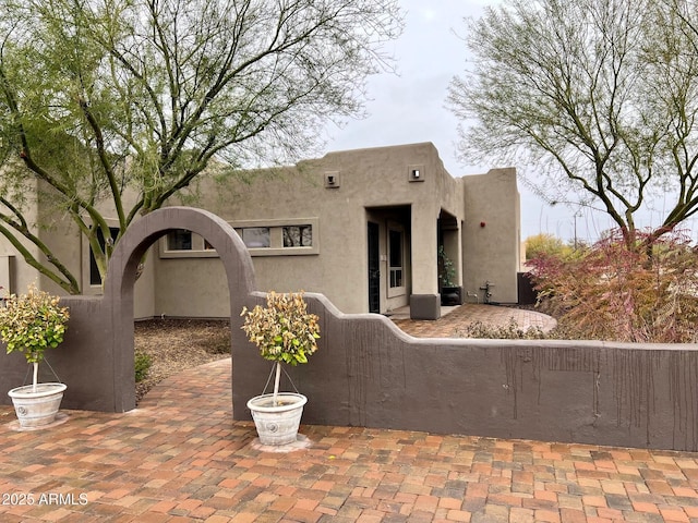 2427 W Desert Hills Estate Dr, Phoenix, AZ 85086 - pueblo-style home featuring stucco siding