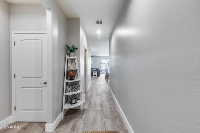 12211 W Hide Trl, Peoria, AZ 85383 - hallway featuring light wood finished floors and recessed lighting