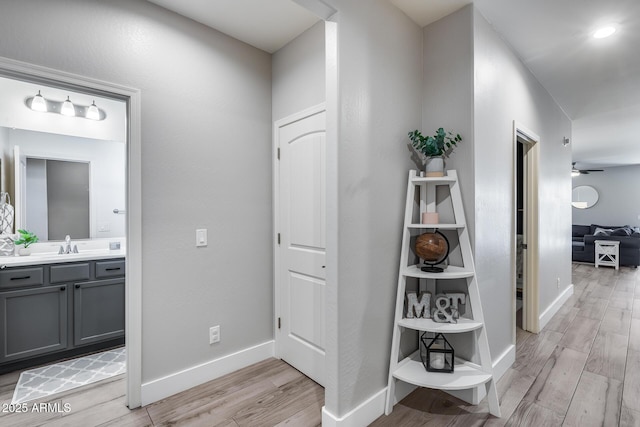 12211 W Hide Trl, Peoria, AZ 85383 - hall featuring light wood-style floors and baseboards